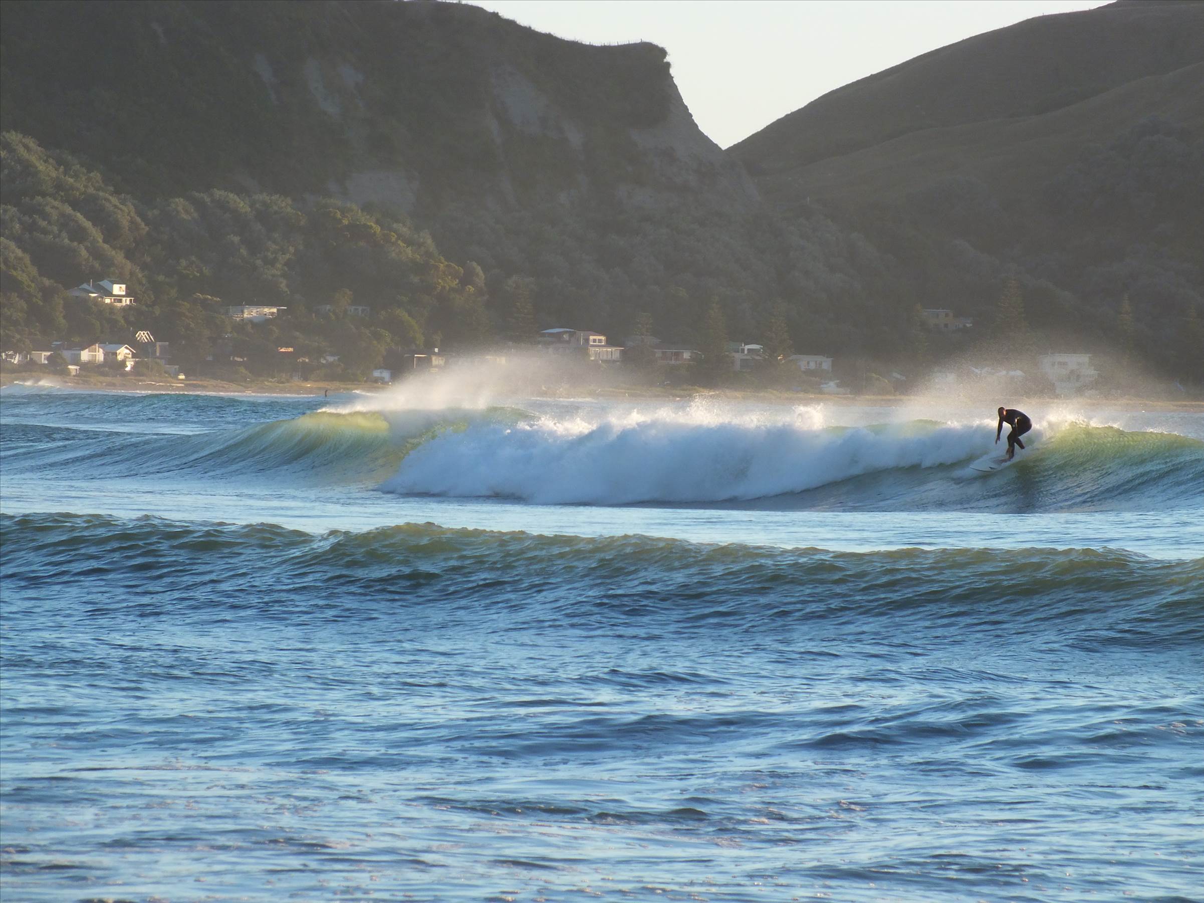 Crescent moon/sunrise over mak