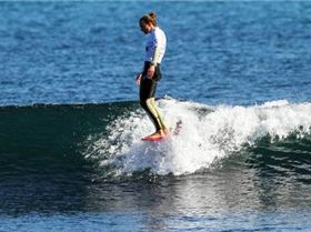 Georgia Young surfing surfer