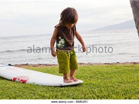 young-boy-hang-ten-surfboard-bm6jr1