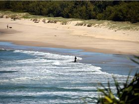 Surfers at Dreamtime Beach