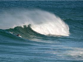 Surfers at Dreamtime Beach