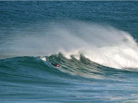 Surfers at Dreamtime Beach