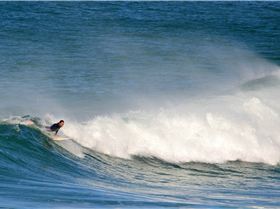 Surfers at Dreamtime Beach