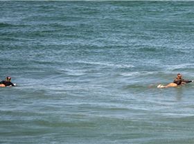 Surfers at Dreamtime Beach