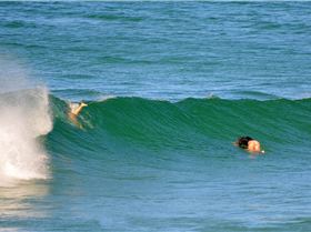 Surfers at Dreamtime Beach