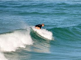 Surfers at Dreamtime Beach