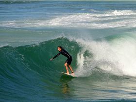 Surfers at Dreamtime Beach