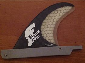 Futures Fin-box that sits inside a single fin box.