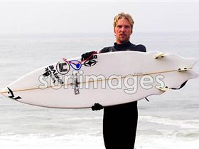 eli-mirandon-holding-surfboard