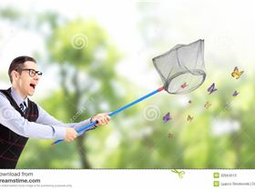 male-catching-butterflies-net-park-young-32564513