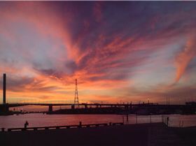 Sunset over Victoria Harbour and Bolte Bridge 