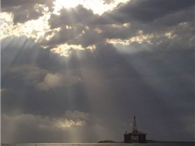 Silvery clouds over the rig