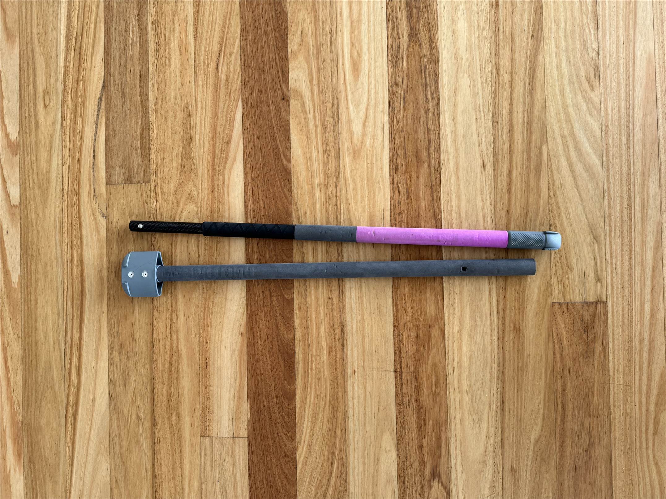 Two piece carbon boom for slick wing