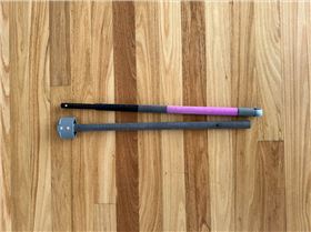 Two piece carbon boom for slick wing