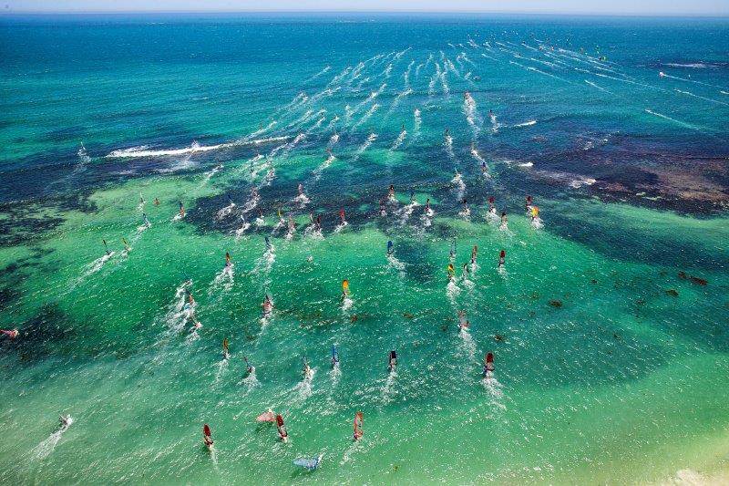 Windsurfers heading out