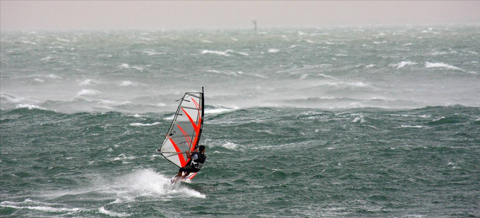 Warrick sailing into a 60 knot+ gust on Port Phillip Bay wed 2nd April  08