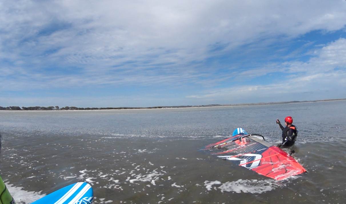 Pass Sue standing in glassy water