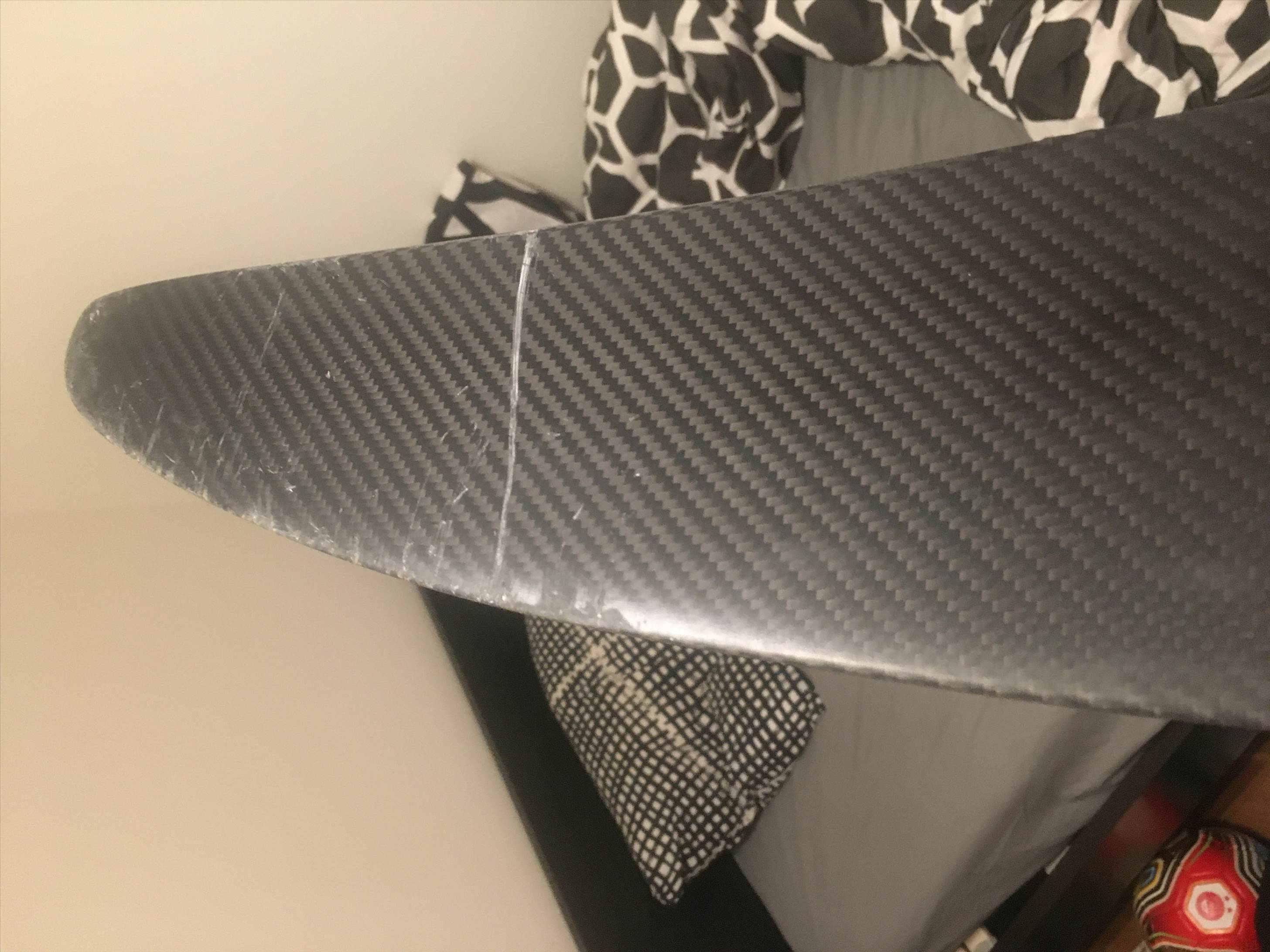 scratched front wing