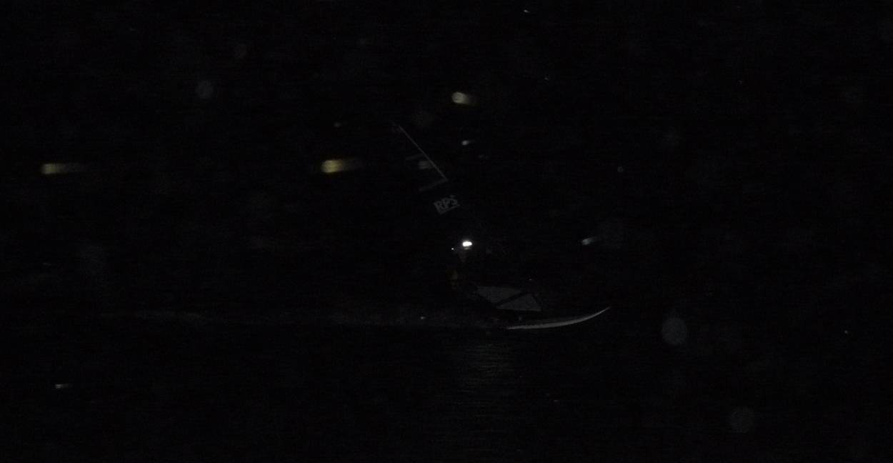 Sandy Point night sailing. Craig and Mat