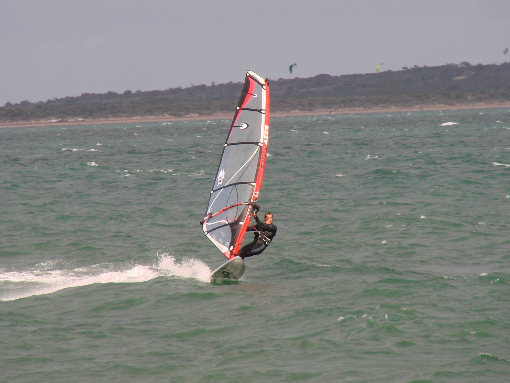 Testing the 2010 95L OES twin fin for speed and turning on flat water next to a single fin