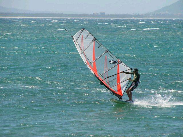 pete sailing his own NXS wave board