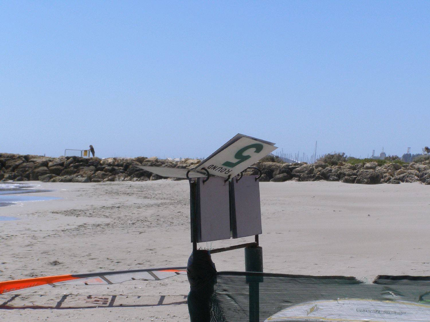 Bev was at the helm handling the rounds...when a good gust hit the rounds went round and round.