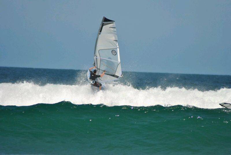 Getting some good waves and getting smashed on my SUP