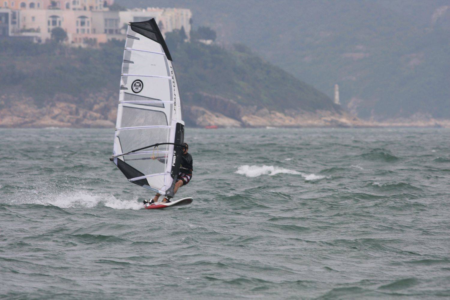 Wind gusting at 35knots, pretty tough on my 5.8m with my 55kgs.....