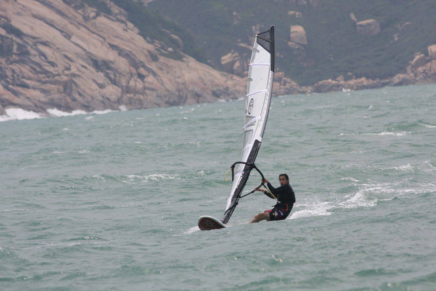 Wind gusting at 35knots, pretty tough on my 5.8m with my 55kgs.....