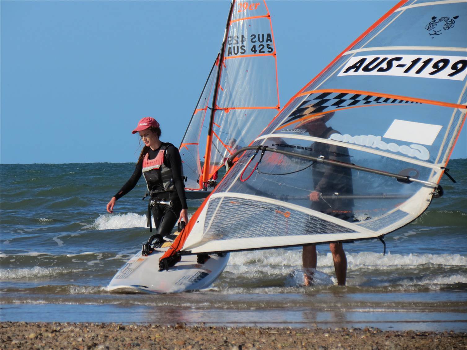 Some of the sailors coming in from a hard day on the water
