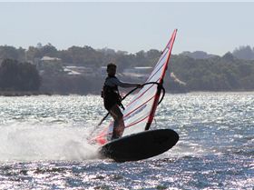 kid windsurfing