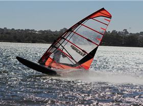 kid windsurfing