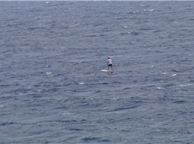 Guy foiling off Hookipa