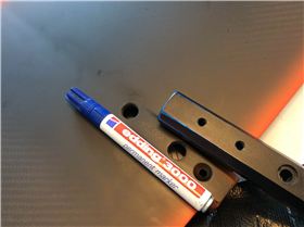 Repainted scratch marks on fuselage