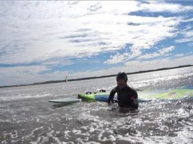 Waist deep in Glassy water with 16 knots of wind.