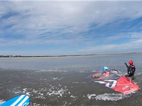 Pass Sue standing in glassy water