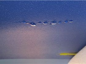 water coming out through crack