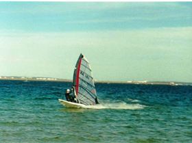 Marek sailing Botany Bay in late 1990s