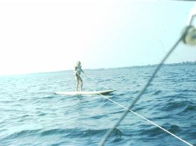 1980 Marek being in tow with Windsurf board behind a sailboat