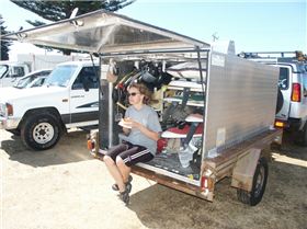 Tiff eating at the back of the trailer