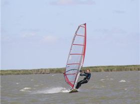 Alex windsurfing at Boggy Lake on the 10th of Feburary