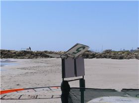 Bev was at the helm handling the rounds...when a good gust hit the rounds went round and round.