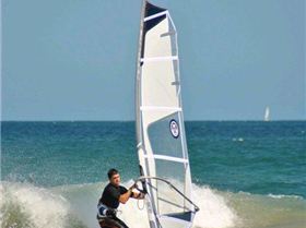 Getting some good waves and getting smashed on my SUP