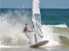 Getting some good waves and getting smashed on my SUP