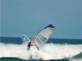 Getting some good waves and getting smashed on my SUP