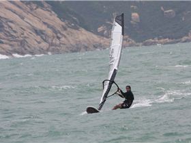 Wind gusting at 35knots, pretty tough on my 5.8m with my 55kgs.....