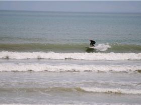 The wind didn't arrive but small wave SUPn was fun