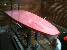 My new board getting the glass sucked on in the vacuum bag, the orange is the bleeder material.