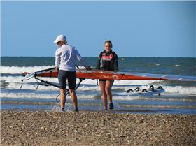 Some of the sailors coming in from a hard day on the water