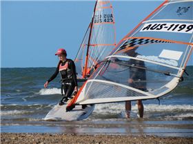 Some of the sailors coming in from a hard day on the water